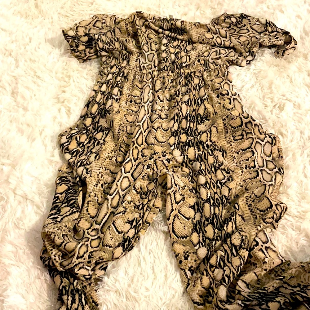 Off the shoulder snake print jumpsuit.